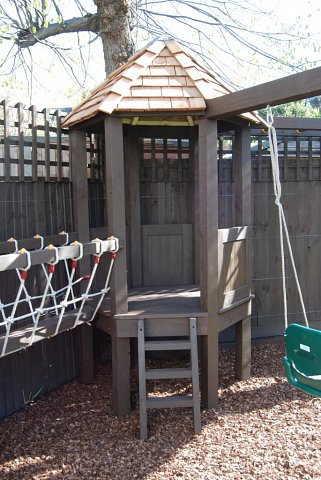 Playframe with rope bridge, play house, monkey bars, swing, fireman's pole 2