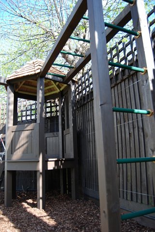 Playframe with rope bridge, play house, monkey bars, swing, fireman's pole 3