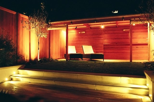 Summer room with canvas drop blinds and bull-nosed York stone steps